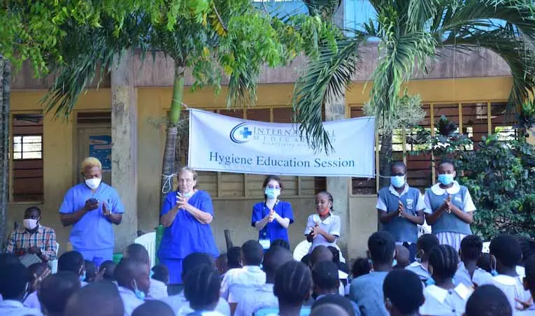 international medical aid participants giving a presentation