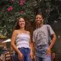Two students smiling to the camera